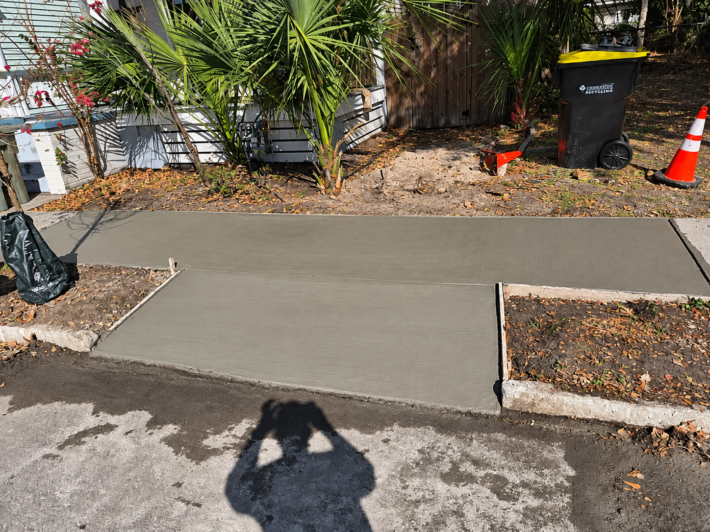 Newly poured sidewalk replacement